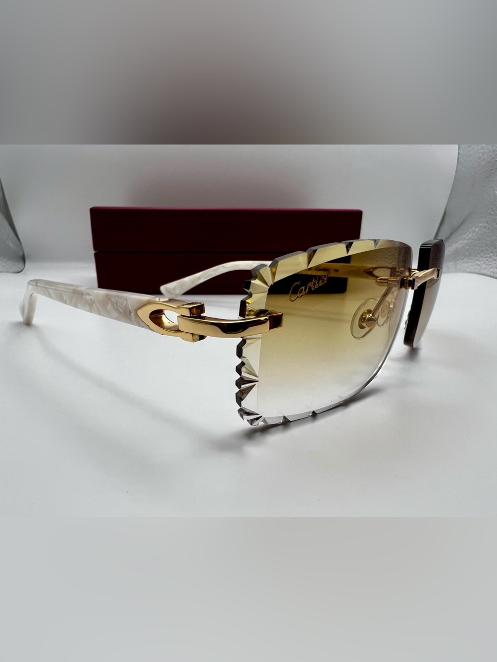 Cartier Gold-Accented Sunglasses with Gradient Amber Lenses